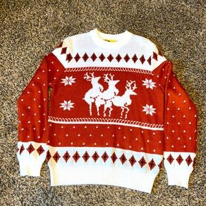 Women’s Tipsy Elves ugly sweater size medium.